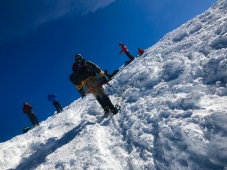 Greg reaching the summit